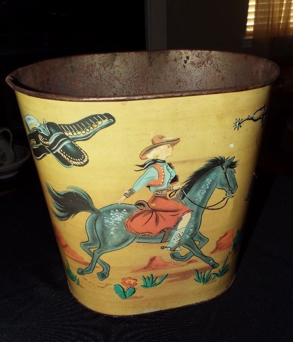 ANTIQUE COWBOY AND COWGIRL WASTE CAN