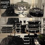 Just a small sample of the Temp-tations Black and White Polka Dotted dishes available; matching carrying cases, napkins and even a black and white polka dotted can opener 