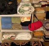 Small sample of the large selection of gorgeous linens and rugs available; comforters, towels, blankets, sheets and more 