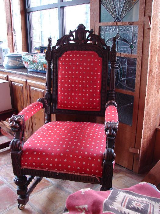 Normandy style or "Throne" chair with red upholstery.