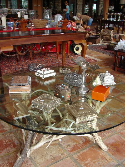 Stag horn base coffee table and assorted boxes.