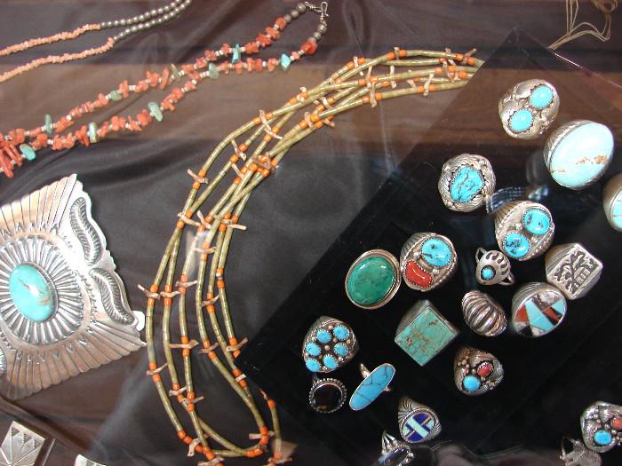 Turquoise and silver Navajo and other SW jewelry. Unusual coral and heshi necklace.