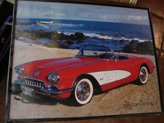 One of several photos and posters of vintage cars.