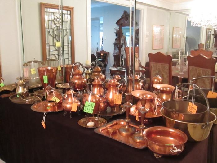 ANTIQUE COPPER AND BRASS COLLECTION: RARE EGG COOKER, COPPER TEA SETS, DRUGSTORE COUNTER STRAW DISPENSER, ICE CREAM SCOOPS, VICTORIAN BRASS BATH FIXTURES, COPPER AND BRASS TRAYS, PITCHERS, BUCKETS, AND MORE. ANTIQUE FRAMED LEADED GLASS.