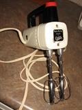 mid century handheld mixer by Oster-works great