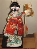 folk art Japanese geisha doll with samurai warrior helmet