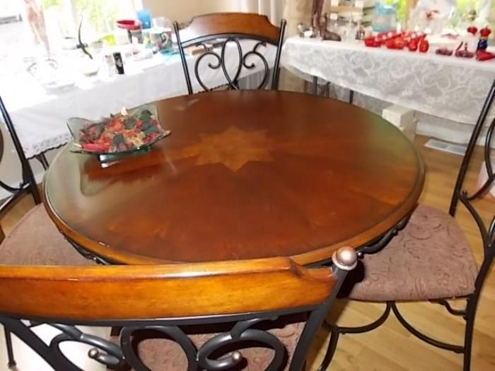 Beautiful hardwood and wrought iron dining set