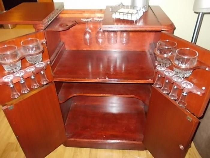 Bar cabinet with glassware