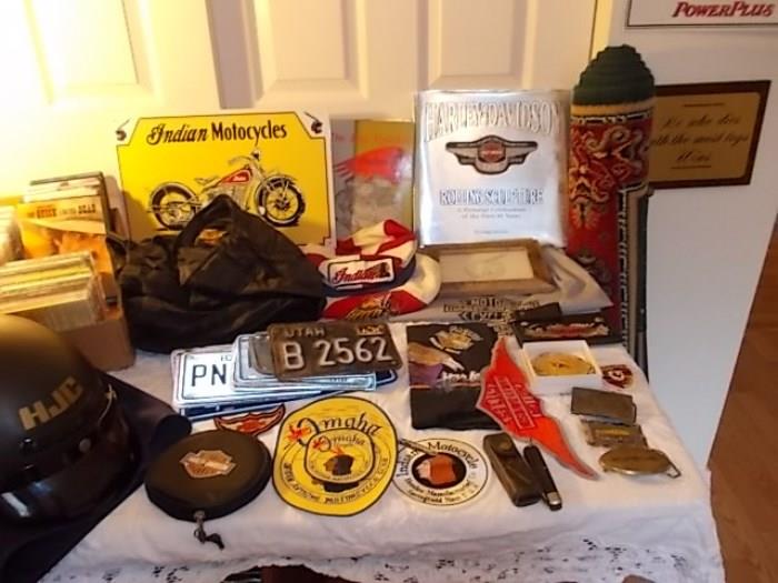 Indian and Harley items, old motorcycle license plates, HJC helmet, Harley and Indian books.