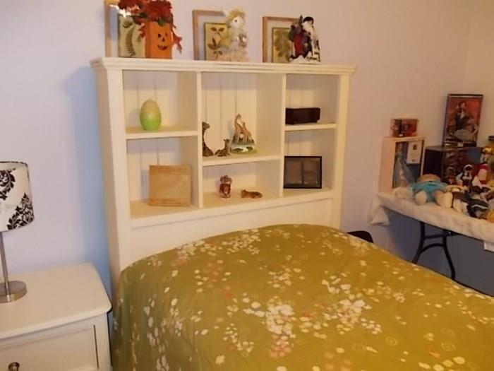 Trundle bed with tall shelf headboard