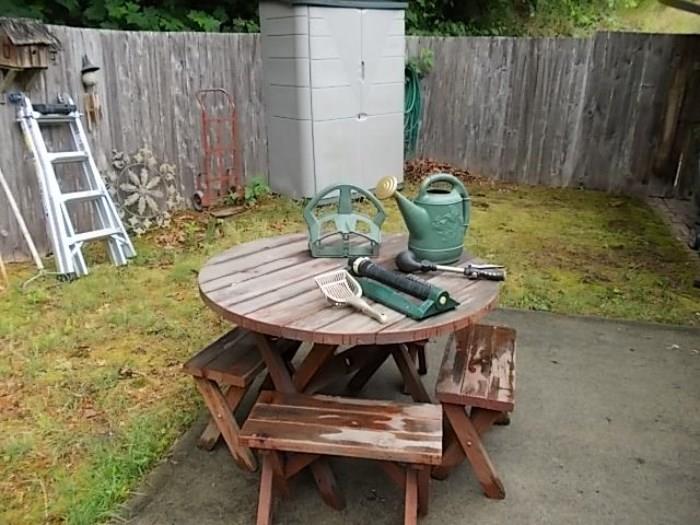 Wood picnic table set and garden tools