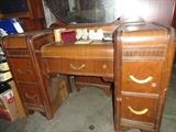 Vanity desk with large round mirror.  View master(s) shown on top