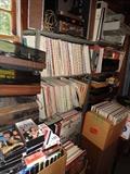 Many records and vintage record players