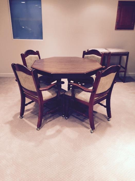wood dining set with four upholstered chairs