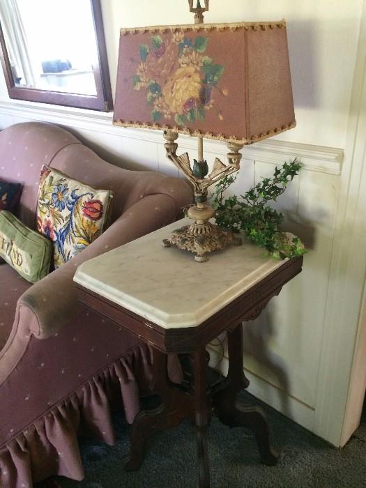 Antique rectangular marble top side table; decorative pillows