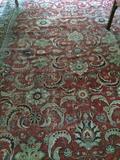    Large, very old rug in red, black, blue, & green