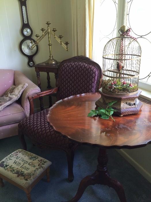 Walnut barometer; armed chair & foot stool; antique pie crust table; musical bird cage