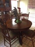 Claw foot antique oak table & chairs; one of the many roosters