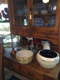    Antique cupboard with a variety of dishes