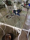 Rectangular, glass top wrought iron table with 2  wrought iron chairs