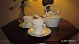 Vintage Metlox Poppytrail Sculptured Daisy Teapot with 2 cup and saucers.