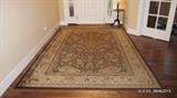 Bidwell Chocolate Area Rug (79" x 116")