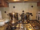 Revereware 12 Qt. Stockpot, Tramontina Pressure Cooker, Faberware pot.