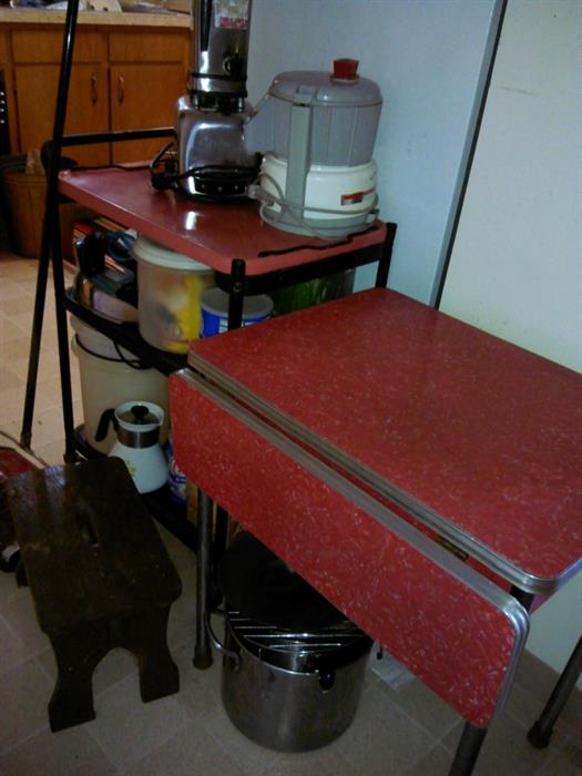 Small drop leaf Formica red dinning table. Pink Retro metal cart.