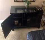 Black two door cabinet with metal hardware details!