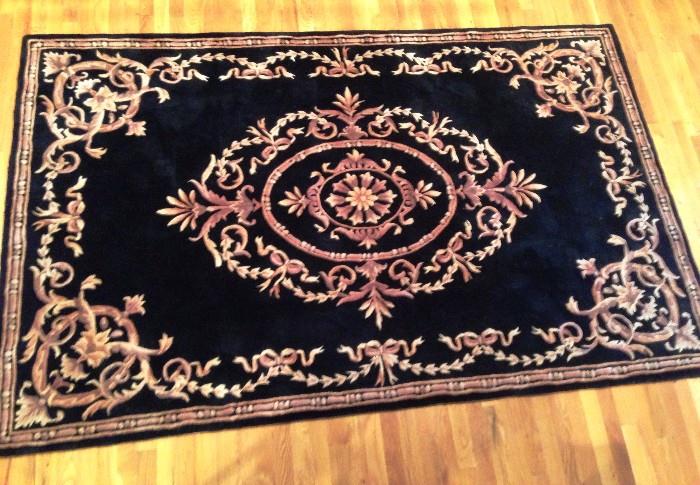 larger plush wool rug black and gold