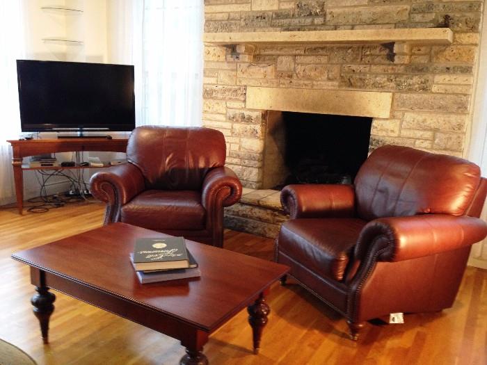 Ethan Allen leather arm chairs. TV in photo not available
