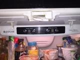 JENN-AIR STAINLESS STEEL REFRIGERATOR ( BROKEN OFF BOTTOM SLIDING DOOR)