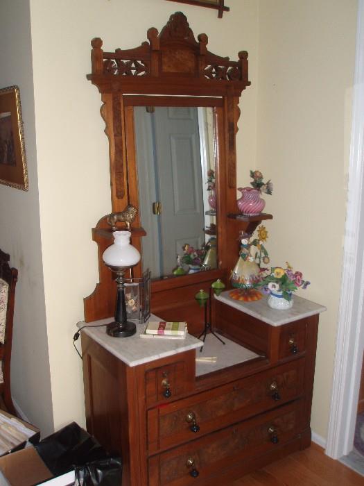 Victorian walnut dresser with burl insets- marble tops- tilt mirror-candle shelves