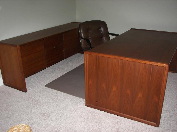 Mid-century teak credenza, desk and chair. Either of the pieces of furniture would work for a flat screen tv or room divider.  