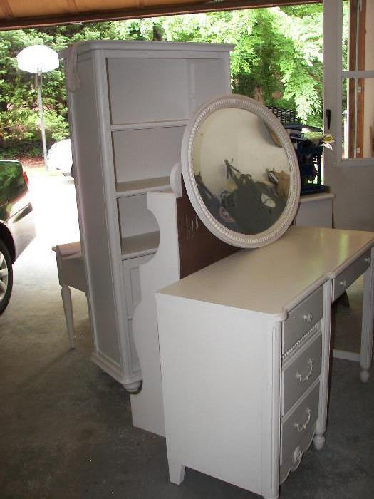 Antique white set includes desk w/ attachable shelves, chair, bookcase, dresser, side table and mirror.  