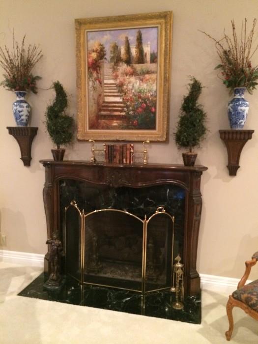 Wall sconces and some of the numerous pieces of framed art and decorative items