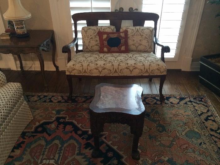     Antique settee and small marble-top table