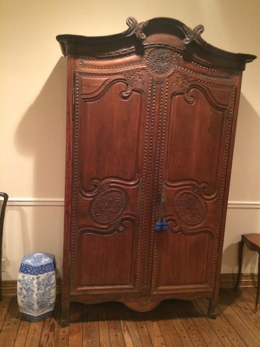 Detailed antique armoire; blue & white garden stool