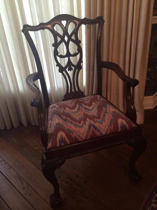    One of the two host Chippendale dining chairs