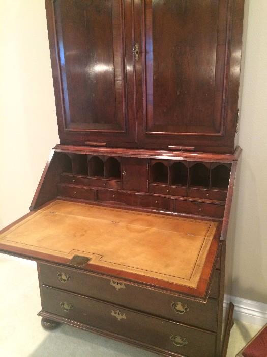          Secretary with leather top writing surface