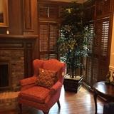 Fireside chair; large artificial plant