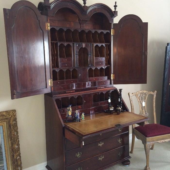 Secretary with leather top writing surface and more that enough storage sections