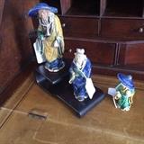 Colorful Asian mud men