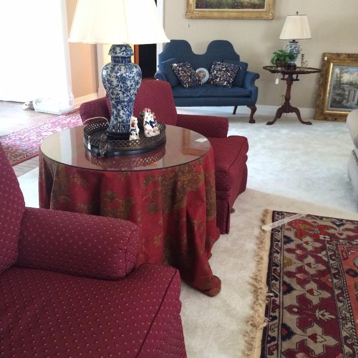     Matching club chairs and  cloth-draped table