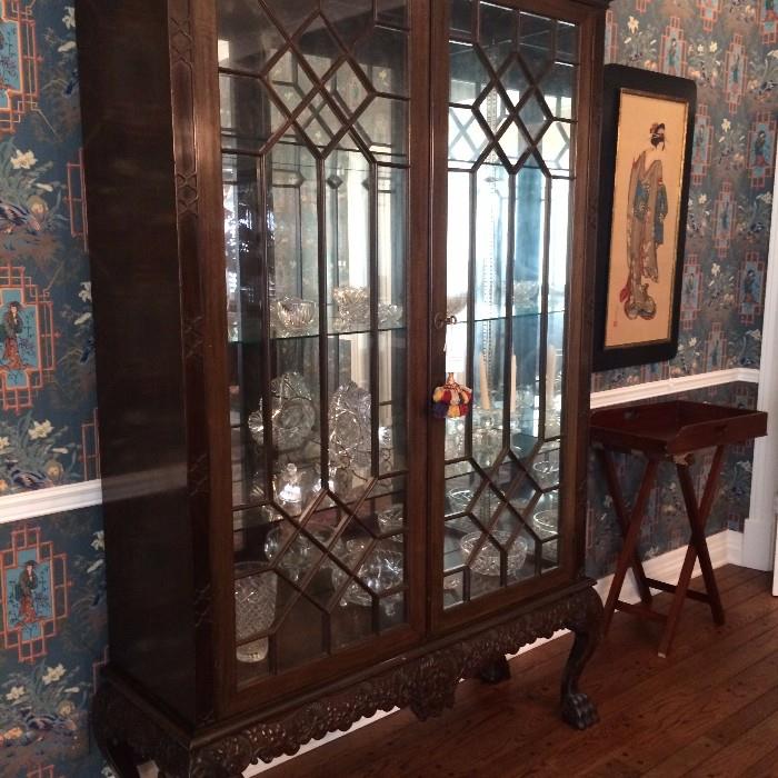  Gorgeous display china cabinet with beautiful  crystal and cut glass; butler's tray; one of two Asian framed Geisha girls.