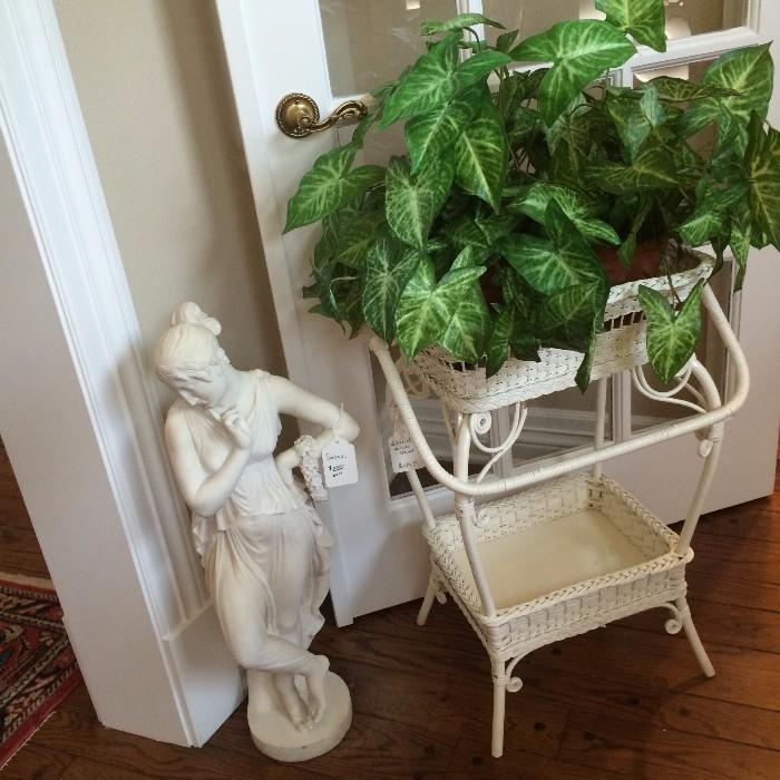    Statue of a lady; white wicker 2-tier planter