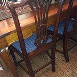 One of the six matching chairs