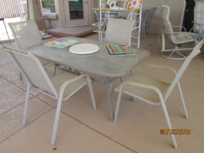 Lots of patio furniture for entertaining