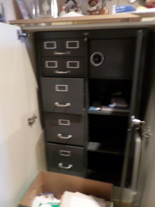 SAFE-4 Drawers on left with key, right side top has combination safe with three shelves below.