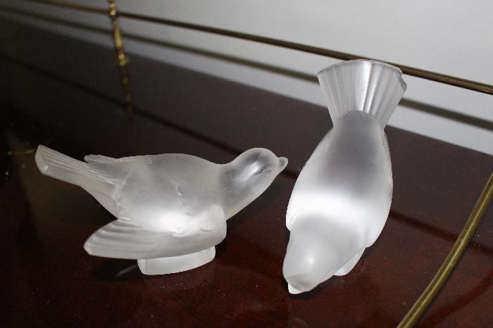 Lalique birds (one on the right has a chip on the tail, but were they mine I'd have that sanded off - they are lovely).